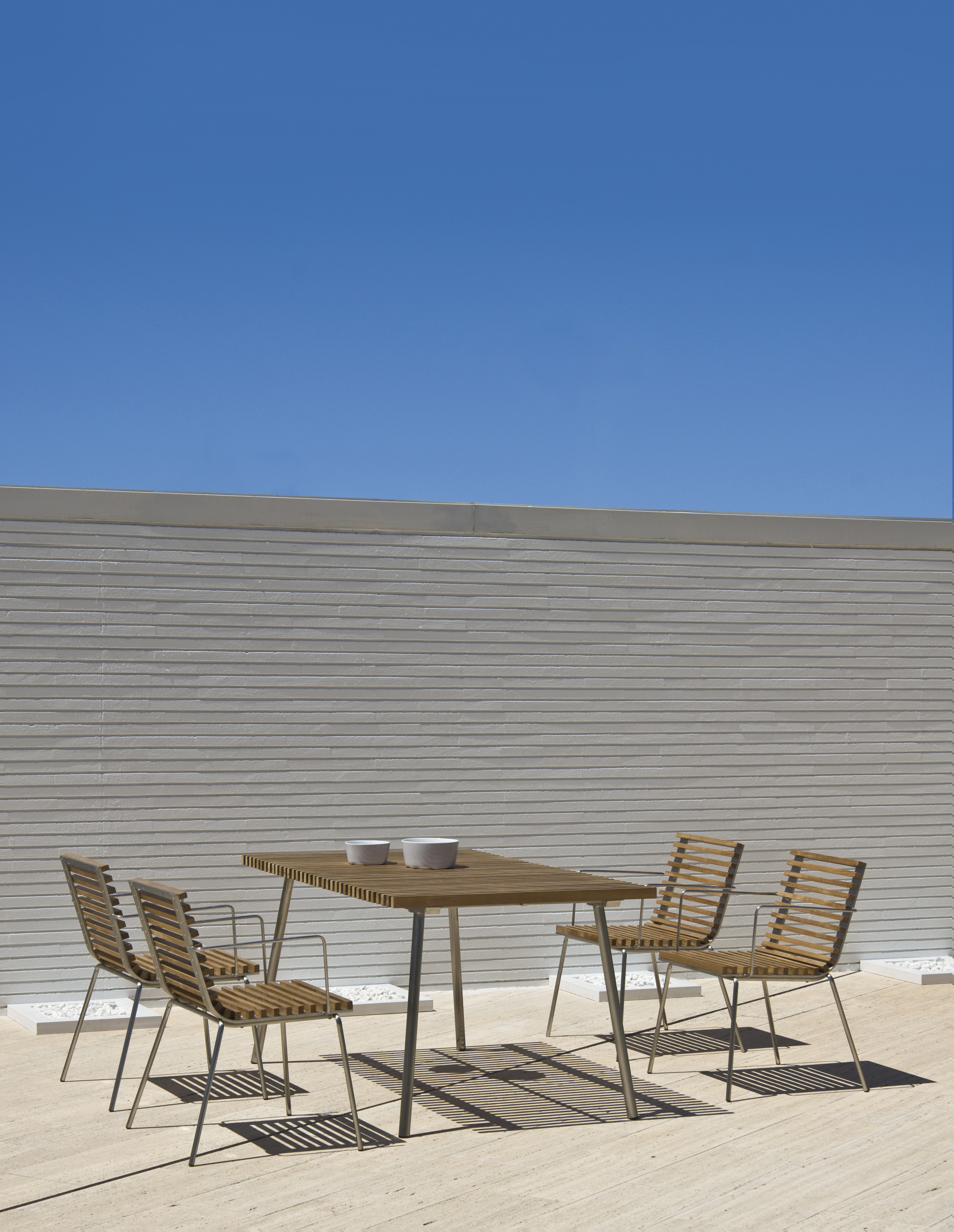 Trama stackable armchair — CALMA archive photograph
