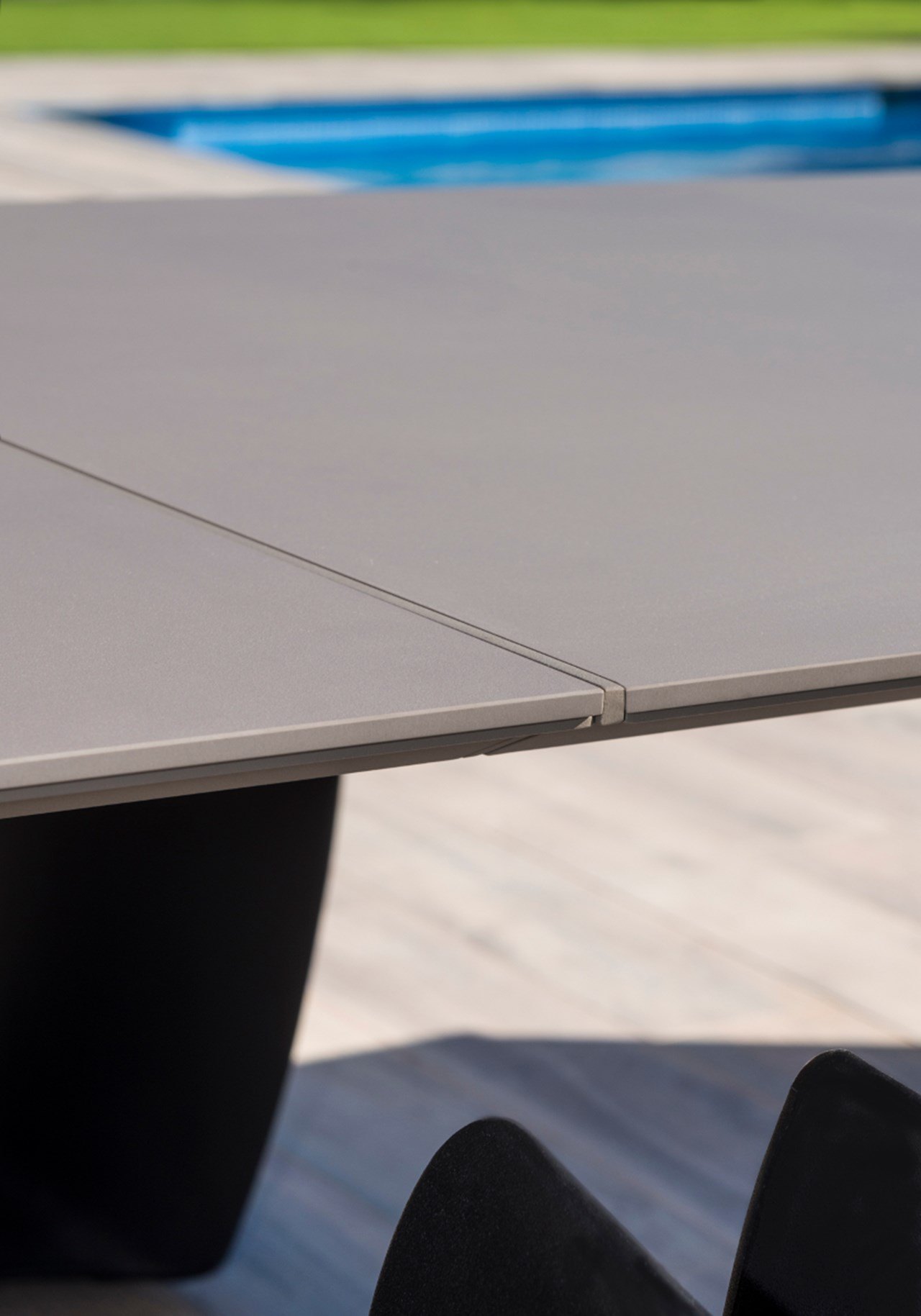 Angle dining table — CALMA archive photograph