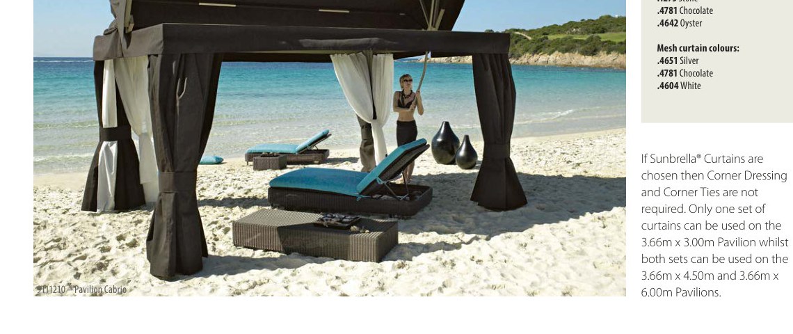 opening-roof pavilion set up on a white-sand beach with turquoise water and loungers